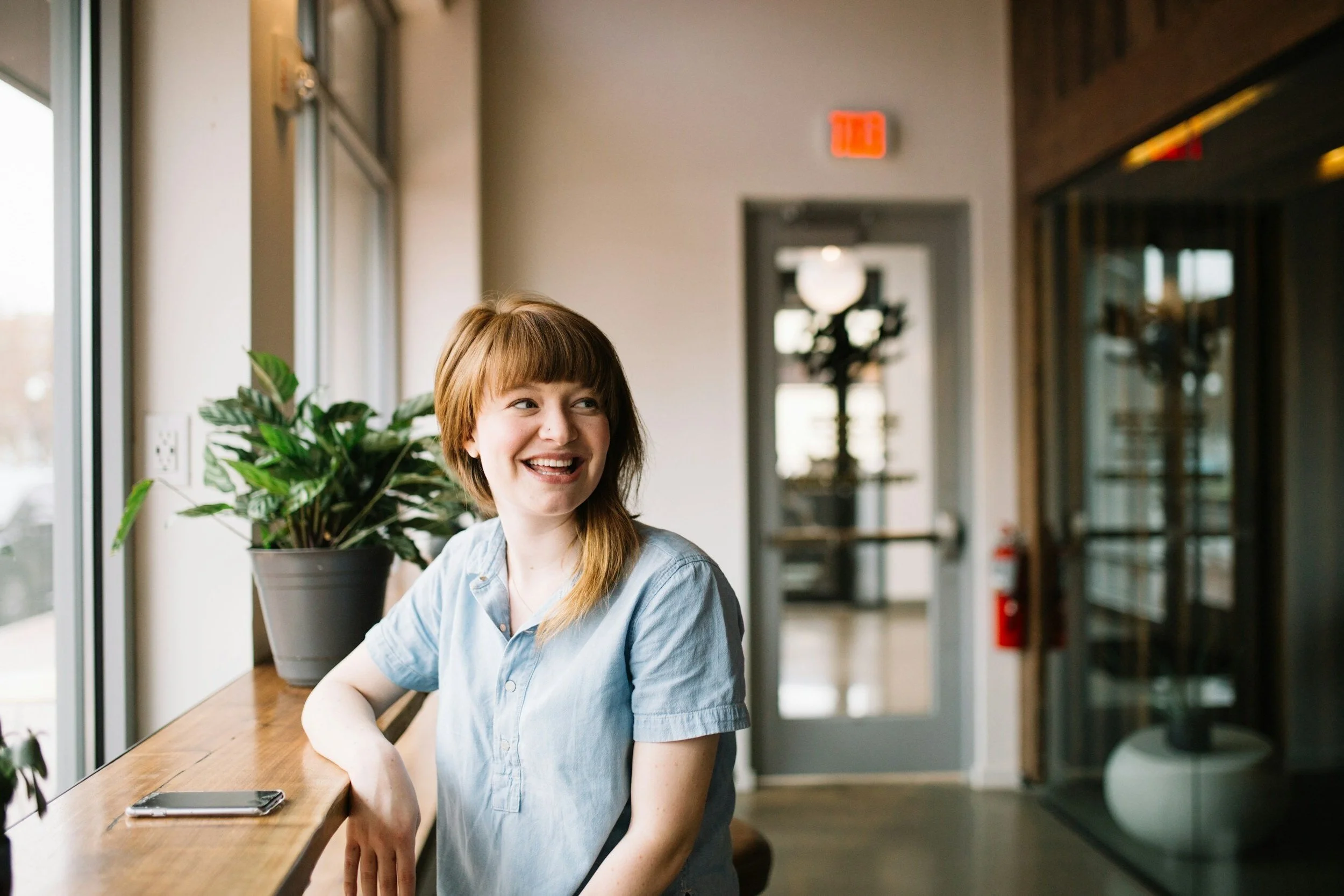 Woman smiling look off